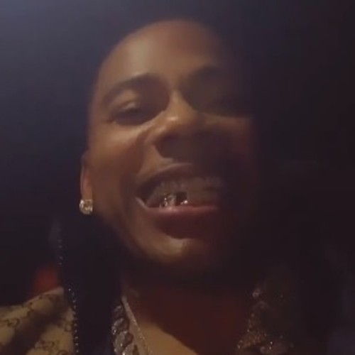 Ashanti laughs at Nelly after he loses a tooth