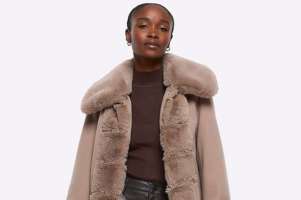 River Island’s ‘cosy’ faux fur coat has been reduced from £110 to £45 in sale- save over 60%