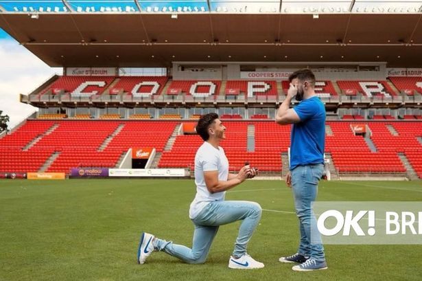 Football’s first openly-gay male player engaged to electrician fiancé in sweet pitch proposal