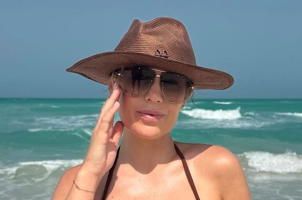 Kate Ferdinand stuns in bikini as she soaks up sun on family holiday with Rio and kids