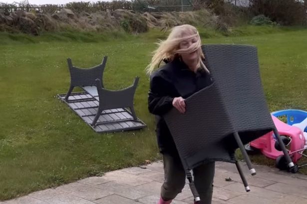 Vanessa Feltz rescues garden furniture as holiday home is battered by Storm Kathleen
