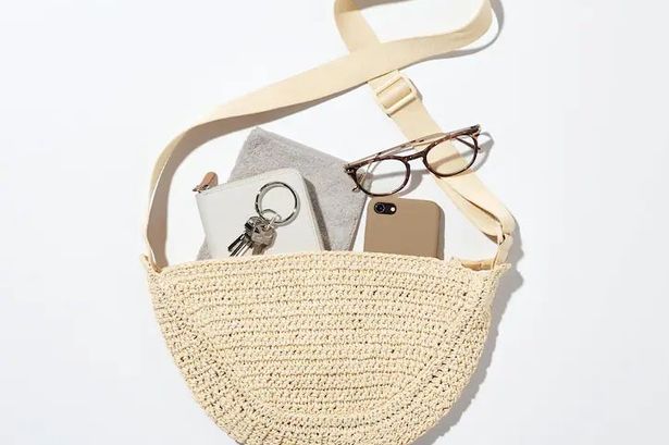 Uniqlo’s released a crochet version of its £25 viral half moon bag that’s perfect for holidays