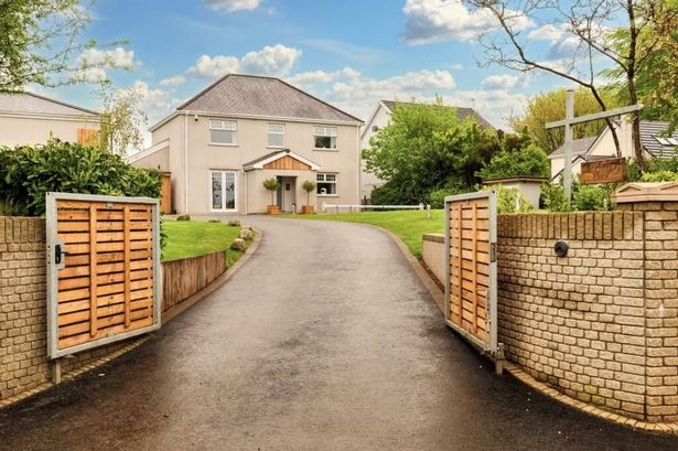 The three-bed house with probably Wales’ poshest garage and a second surprise in the garden