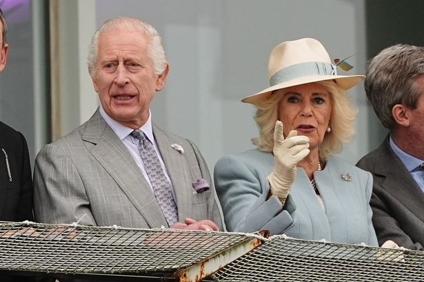 King Charles and Queen Camilla beam as they make surprise visit to Epsom races