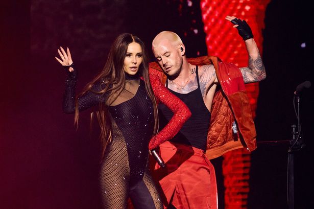 Cheryl ‘shaken’ as she’s ‘yanked off stage’ by fan during Girls Aloud gig