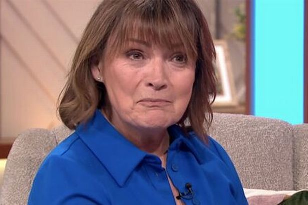 Lorraine Kelly left red-faced as wild football fans ambush live interview